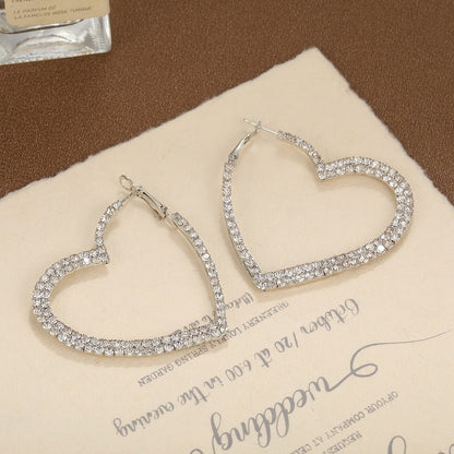 Hot selling cool style exaggerated hollow out love big earrings for women's personality simple and high-end earrings